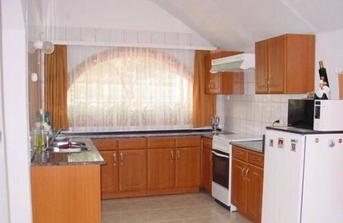 Sukoro House | holiday home "Zonnehuis" with private swimming pool