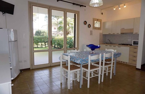 Porto Santa Margherita House | Holiday home with outdoor swimming pool and terrace