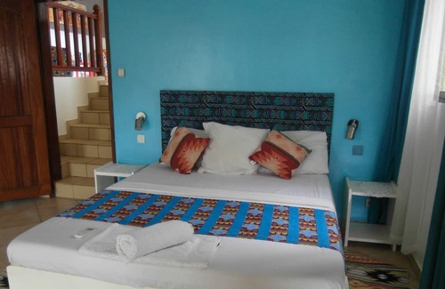 Grand Popo Apartment | Homerez - 10 m away from the beach! Nice studio for 2 ppl. with shared pool