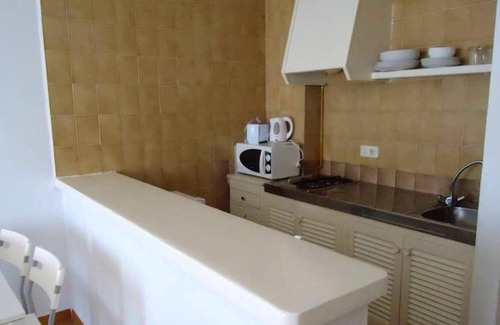 San Antonio Bay Apartment | Homerez - 250 m away from the beach! Apartement for 3 ppl. with shared pool