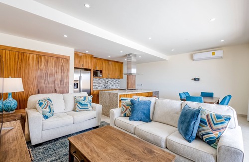 Libertad Apartment | Immaculate stay with stunning views, balcony, plus on-site pool & gym