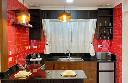 Kampala House | In a vibrant neighborhood , everything is just a short walk or drive away.