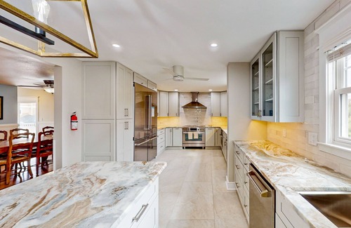 Sandbridge House | Incredible bayfront home with private dock, pool & 2 fireplaces