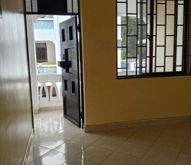 Manyimbo House | Indian ocean apartments you get the master bedroom with the private bathroom and the host sleeps in the other bedroom you share kitchen anc living room