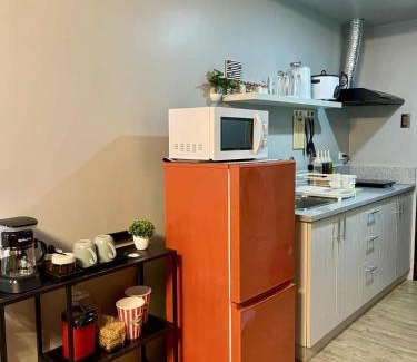 Las Pinas Apartment | Industrial Chic with Pool, Netflix, and Games in Las Pinas