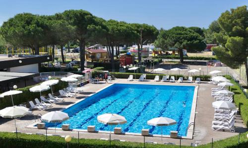 Marina di Bibbona Apartment | ISA-Apartment 4 beds with private outdoor space in Residence with swimming-pool in Marina di Bibbona, only 300 meters from the sea