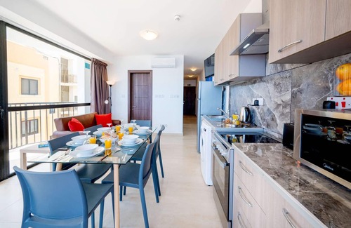 Qawra Apartment | Islet Promenade Seafront Apartment with large Corner Terrace