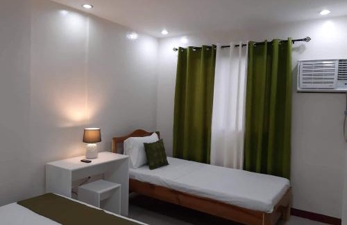 Puerto Princesa City Centre Hotel | J and C Residences