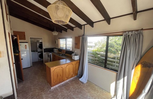 Papamoa Beach House | Just a walk away from the beach! and local restaurants and bars.