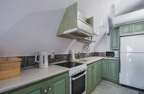 Kalyves Apartment | Karavos View - A unique artists' hideaway Paradise