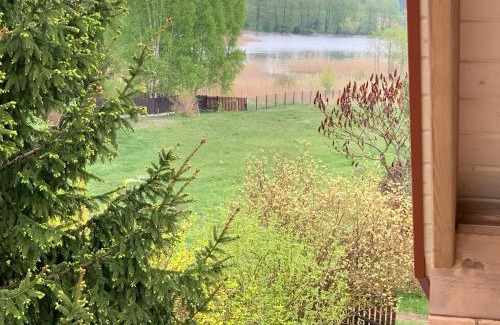 Karwie House | KrzyweProgi - domek na Mazurach nad jeziorem Krzywe