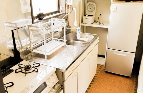 Kusatsu Onsen House | Kusatsu Onsen hot spring bath with free-flowing hot-spring water! 5 minutes by car to Yubatake! Projector for unlimited movie watching! Indoor barbecue available! A rental villa overlooking the great outdoors where you can relax while watching a real fire