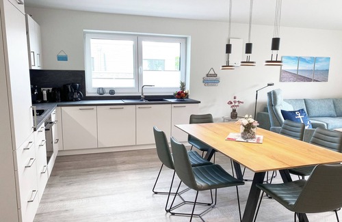 Tossens Apartment | KÜSTE33/48 - Family time. Sauna. Roof terrace.