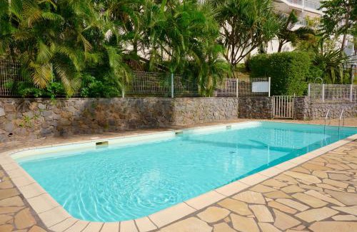 Saint-Denis Apartment | L'horizon bleu, vue, clim, piscine à proximité de l'aéroport