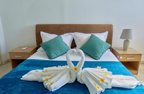 Saint-Denis Apartment | L'horizon bleu, vue, clim, piscine à proximité de l'aéroport