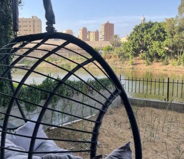 Old Cairo Apartment | Lake and nile view garden area