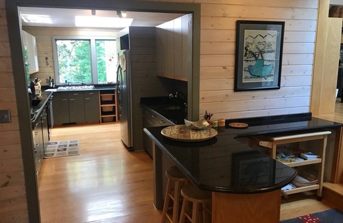 Traverse City House | Lakefront Escape: Spacious 5-Bedroom Home with dock, kayaks, and great views