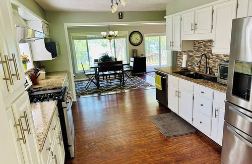 Wagoner House | Lakeside cabin with beautiful lake view, hot tub, and .5 mi from beach & marina