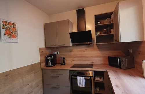 Flattach House | Large 125m² apartment with balcony and fireplace for 6 to 12 people in Flattach!