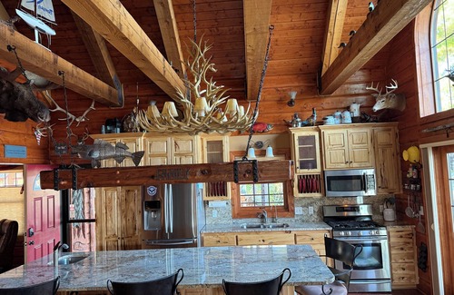 Whipholt Cabin | Leech Lake Waterfront Home, Panoramic Views 3bd/2ba and swinging firepit chairs.