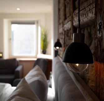 Marktbreit Hotel | Lehm & Stil - Wohnen in nachhaltiger Atmosphäre