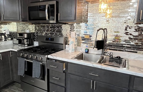 Ferguson House | Leopardprint Executive Suite #2