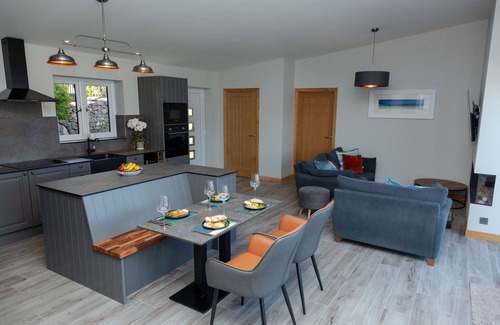 Garve House | Lodge with private hot tub.