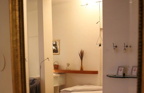 Oberhausen Apartment | Loft with parquet and designer lights by Ingo Maurer - attractive and stylish