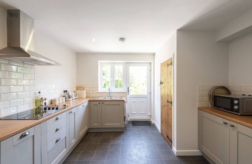 Buckland Newton Cottage | Log burner, heated pool, pub- what's not to like!