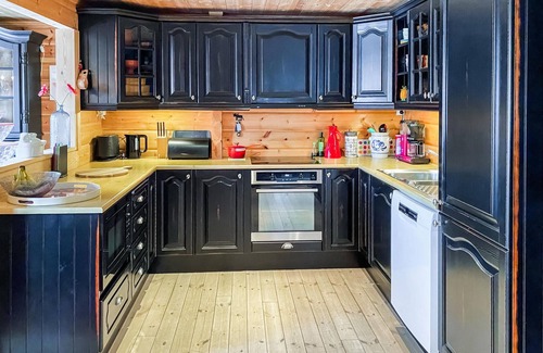 Bjorli House | Look forward to this comfortable vacation home with outdoor jacuzzi and sauna.