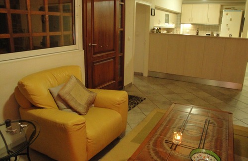Saronida Apartment | Lovely 2-bed Apt with patio 5 mins to the Beach Family friendlyAptFenced garden
