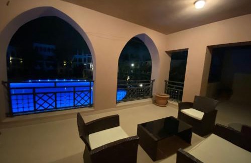 Aqaba Apartment | Lovely first floor tow bed rooms overviewing circular pool for families only in Talabay Aqaba