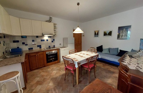 Rosignano Marittimo Apartment | Lovely flat with private covered terrace,large pool and shared garden,Wi-Fi.