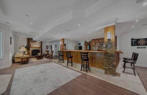 Uxbridge House | Luxurious 5-Bedroom Mansion with Hot Tub, Sauna, Game Room, Wine Cellar, Gym