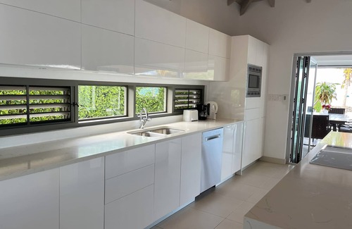 Jolly Harbour House | Luxurious beachfront villa with private pool