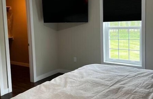 Good Spirit Lake House | Luxurious king size,hot tub!