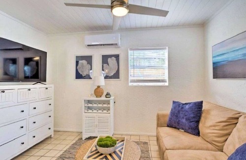 Leisureville Cottage | Luxury 1 Bedroom Cottage with Resort Style Heated Pool In Tropical Paradise!