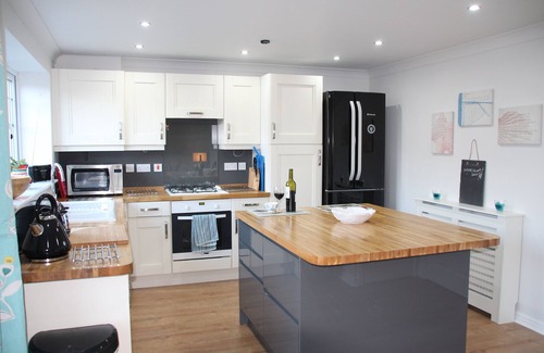 Seahouses House | Luxury family beach retreat with Hot Tub 150 m to beach.