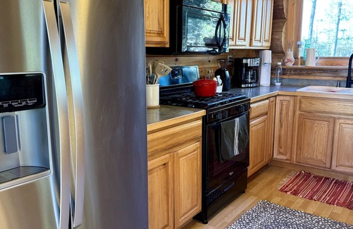 Park Rapids Cabin | Luxury log cabin on nearly 2 acres with dock, beach, and water toys!