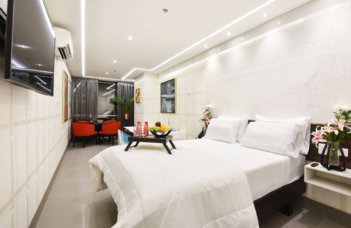 El Poblado Hotel | Luxury Room with Jacuzzi