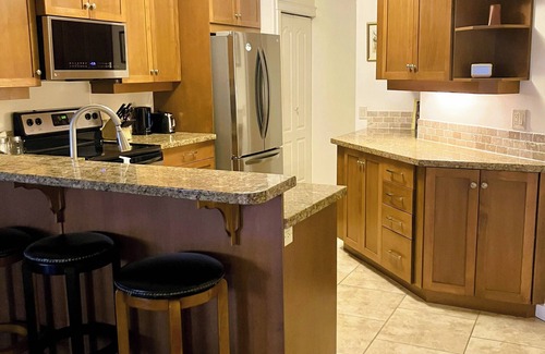 Okanagan-Similkameen Condo | Luxury top-floor Penthouse with private dock, pool and stunning lake views.