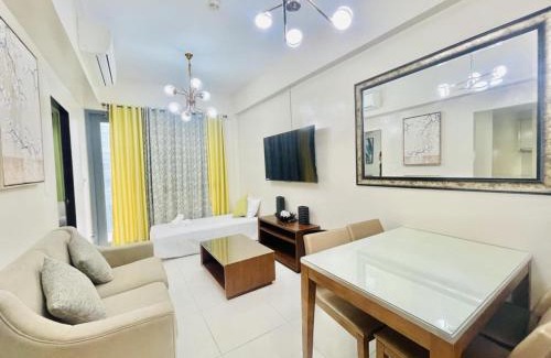 Lapu-Lapu Apartment | MACTAN NEWTOWN FAMILY ROOM Deluxe with free wi-fi, POOL & GYM