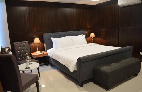 Santiago City Hotel | Mango Suites - Santiago