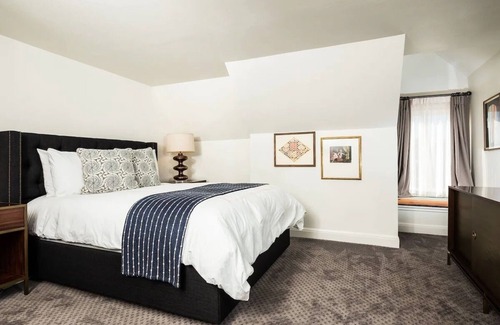 West Campus Hotel | Mansion Queen, Hotel Ella, Historic Elegance, Modern Comforts, Central Location