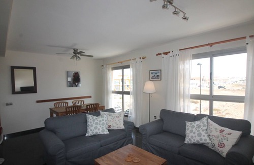 Los Lagos Apartment | Marfolin 29. El Cotillo Beach front 2 bedroom apartment with roof terrace. WiFi