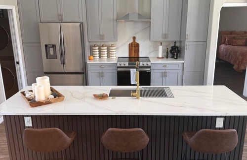 Pelican House | McShandy's 4B2B modern home with heated pool and gulf access