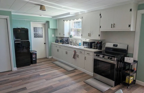 Hickory House | Mid-Century lake view home.