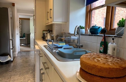 Fiddington Cottage | MILL POND COTTAGE, pet friendly, with a garden in Williton