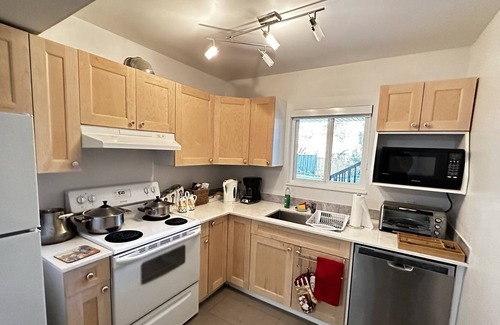 District of North Vancouver House | Modern 3 Bedrooms, 2 Bathrooms, 2 kitchens, Fully Renovated Garden level