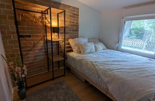 Wunsdorf House | Modern bungalow with direct lake access and fireplace